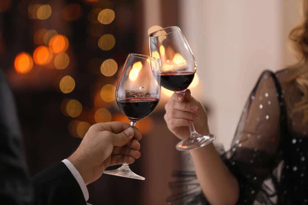 A couple with wine on Valentine's Day.